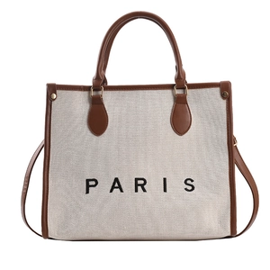 Bolso tote minimalista de lona beige con ribete de cuero marrón y estampado de París