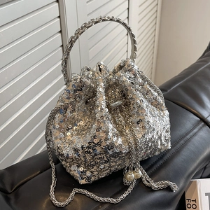 Silver sequin bucket bag with rhinestone ring handle and elegant pearl drawstring charms