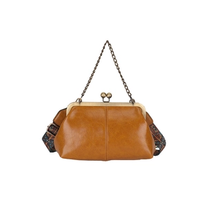 Brown vintage shell doctor bag with retro clasp and colorful geometric shoulder strap