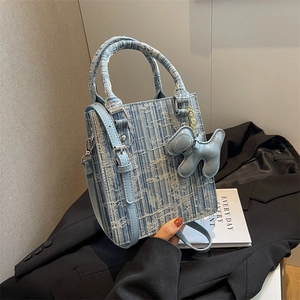 Blue and white tweed woven tote bag with leather strap and cute dog charm pendant