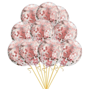 Detail of 10 clear latex balloons with rose gold sequins and golden spiral ribbons