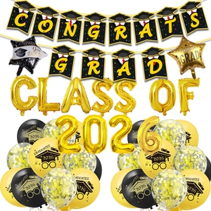 2026 graduation party decoration kit with Congrats Grad banner and gold foil balloons