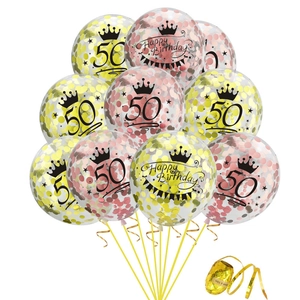 Detail of 50th birthday clear balloons with gold sequins, crown print and ribbon
