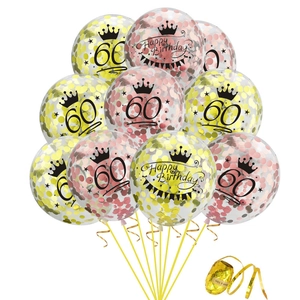 Detail of clear 60th birthday confetti balloons with gold ribbon and crown graphics