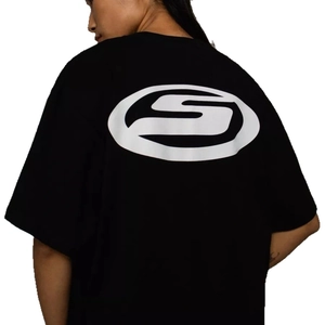 Oversized black Y2K T-shirt with white graphic print on the back for a high street look