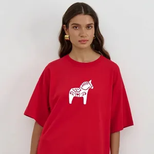 Oversized red cotton T-shirt featuring a white Dala horse folk print for women