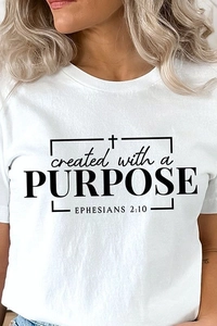 Close-up of Created with a Purpose text print on white cotton crewneck t-shirt
