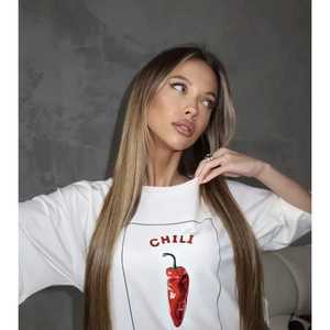 White cotton t-shirt with chili print and crew neck shown on a female model