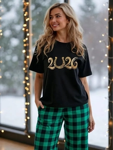Cozy pajama set with 2026 print black short sleeve top and green plaid lounge pants
