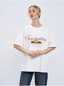 Detail shot of vintage classic car print and lettering on white oversized cotton t-shirt