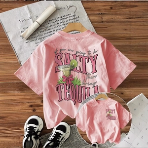 Pink crew neck cotton T-shirt featuring artistic cocktail print and salty tequila text