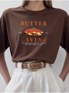 Detail of soft cotton t-shirt with caviar and butter artistic illustration print