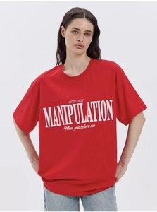 Detail of red cotton T-shirt featuring white artistic letter print and crew neck