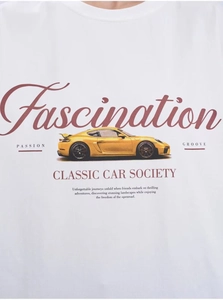 Detail shot of the yellow classic car graphic print and artistic text on white cotton T-shirt