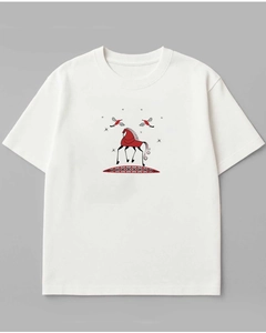 Close-up of white cotton T-shirt featuring red ethnic horse and bird graphic print