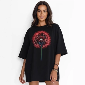 T-shirt ample en coton noir avec motif graphique de pissenlit rouge élégant