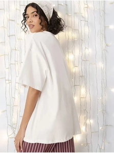 T-shirt blanc oversize en coton avec épaules tombantes et coupe style urbain décontracté