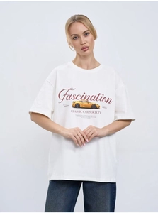 Detail of white cotton oversized T-shirt with classic car graphic and red lettering