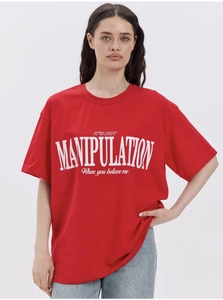 Detail of white artistic typography print on high-quality red cotton oversized T-shirt