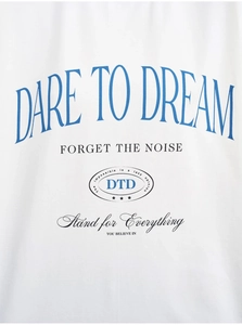 Detail of Dare to Dream blue letter print on premium white cotton t-shirt fabric