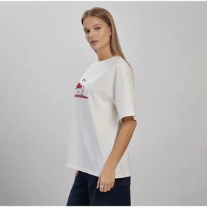 White cotton t-shirt featuring a red horse graphic print in a loose casual fit