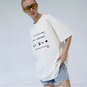 Oversized white cotton T-shirt featuring a music player graphic and retro print design