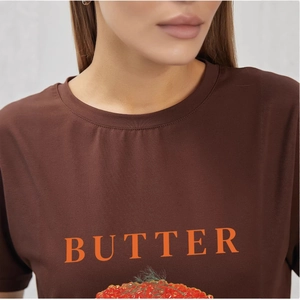 Brown cotton t-shirt for women with orange BUTTER text and berry print in a casual style
