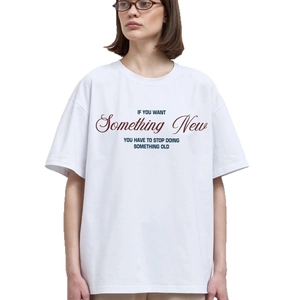 Women's white cotton oversized T-shirt with vintage slogan print and round neck