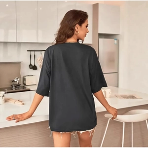 Women's charcoal grey oversized heart print t-shirt with drop shoulders and raw hem