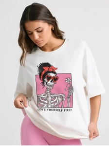 Detail of white cotton T-shirt featuring retro bone illustration and Love Yourself First text