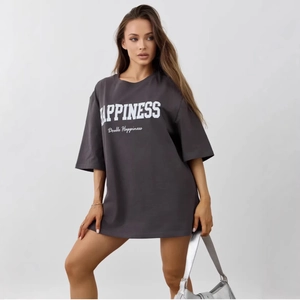 Oversized dark grey 100% cotton T-shirt featuring white Happiness typography print