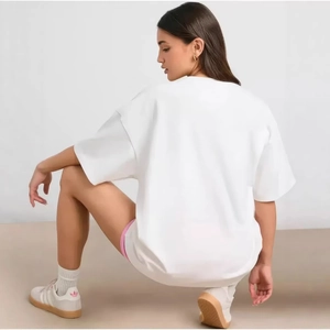 Oversized white cotton short sleeve T-shirt with loose fit and dropped shoulders