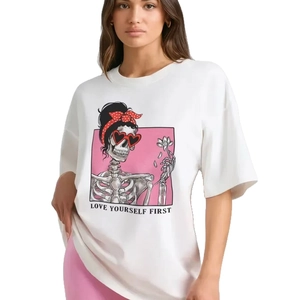 Oversized white cotton T-shirt featuring a skeleton art print and Love Yourself First text