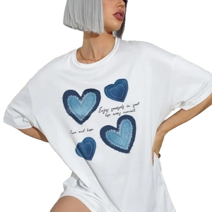 Women's white cotton T-shirt with blue denim-textured heart prints and stylish slogan