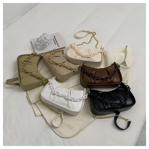 Detailed collection of ruched cloud bags in various colors with thick chain decorations