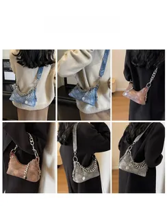 Retro crescent shoulder bag with metallic chain detail and cross-stitch texture design