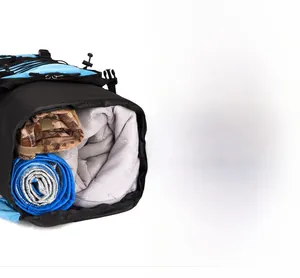 Detail of 90L hiking backpack showing large interior storage and blue sleeping pad