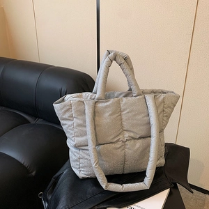 Chic quilted grey tote bag with shimmering finish and large capacity for winter daily commute