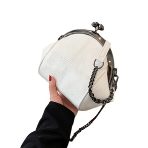 White quilted leather shell crossbody bag with retro metal frame and chain strap