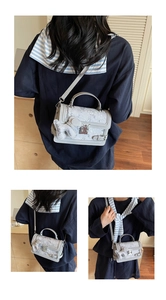 Detailed views of grey vintage floral crossbody bag with plush bunny charm and silver buckle