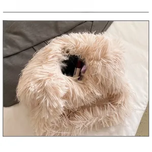 Close-up of fluffy faux fur bag interior showing large capacity for cosmetics