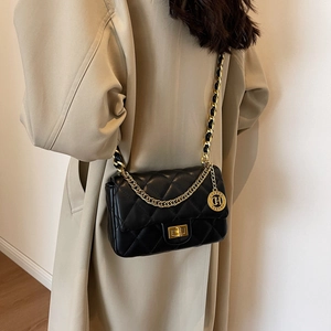 Elegant black quilted shoulder bag with gold chain strap and diamond stitch pattern