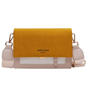Sac bandoulière bicolore avec rabat jaune dépoli et corps crème blanc élégant