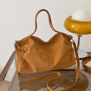 Large capacity ginger brown leather tote bag with side pleats for daily commuting