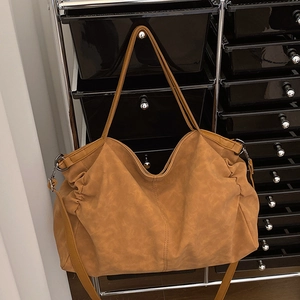 Caramel brown large capacity tote bag with matte texture and adjustable strap for women