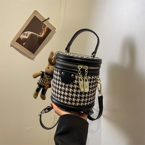 French vintage houndstooth bucket bag with leather trim and rabbit doll charm