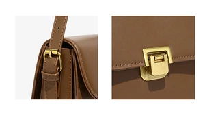 Detail of adjustable shoulder strap buckle and gold-tone metal clasp on brown leather bag
