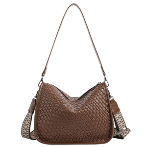 Brown woven crossbody bag with large capacity and decorative jacquard shoulder strap