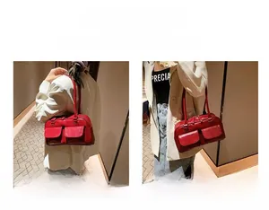Red retro glossy shoulder bag with dual front flap pockets and versatile straps
