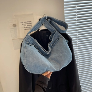 Street style large denim hobo bag in washed blue with casual shoulder strap design